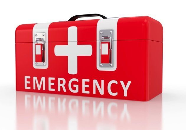 A red emergency case with the word " emergency " written on it.